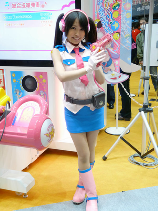 Illustration for article titled 2009's Cosplaying Arcade Game Booth Companions